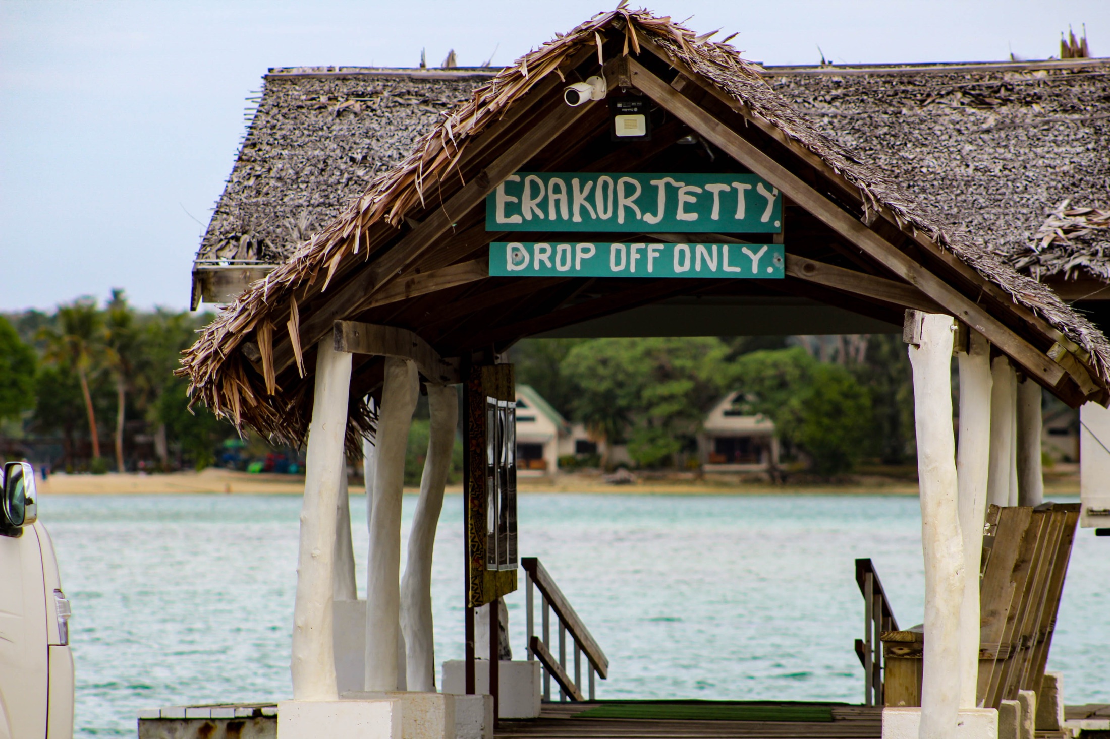 A local passenger van at a waterfront transfer point.
